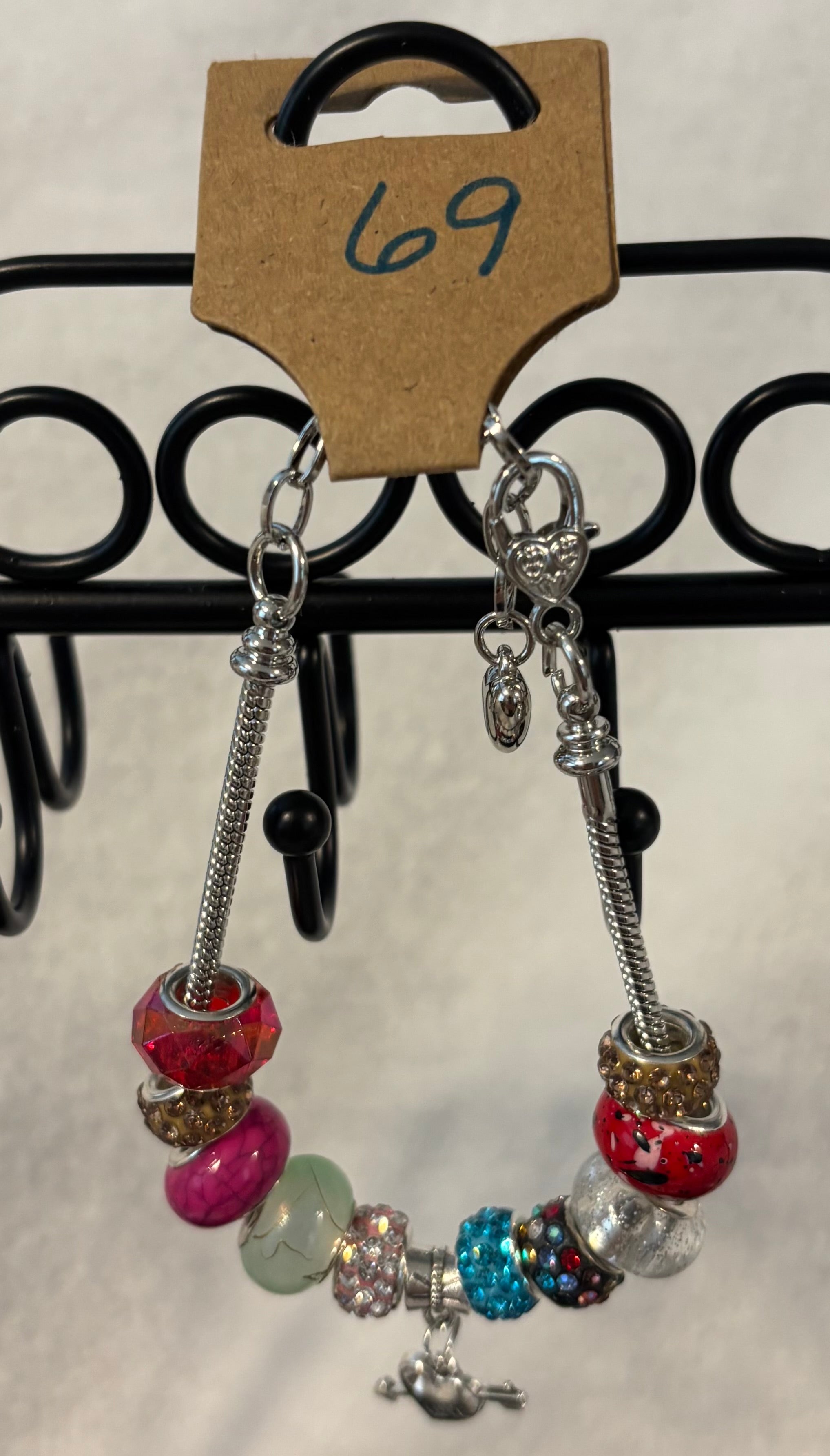 Silver adjustable bracelet with heart arrow charm