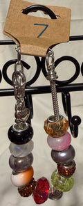 Silver adjustable bracelet with lip charm