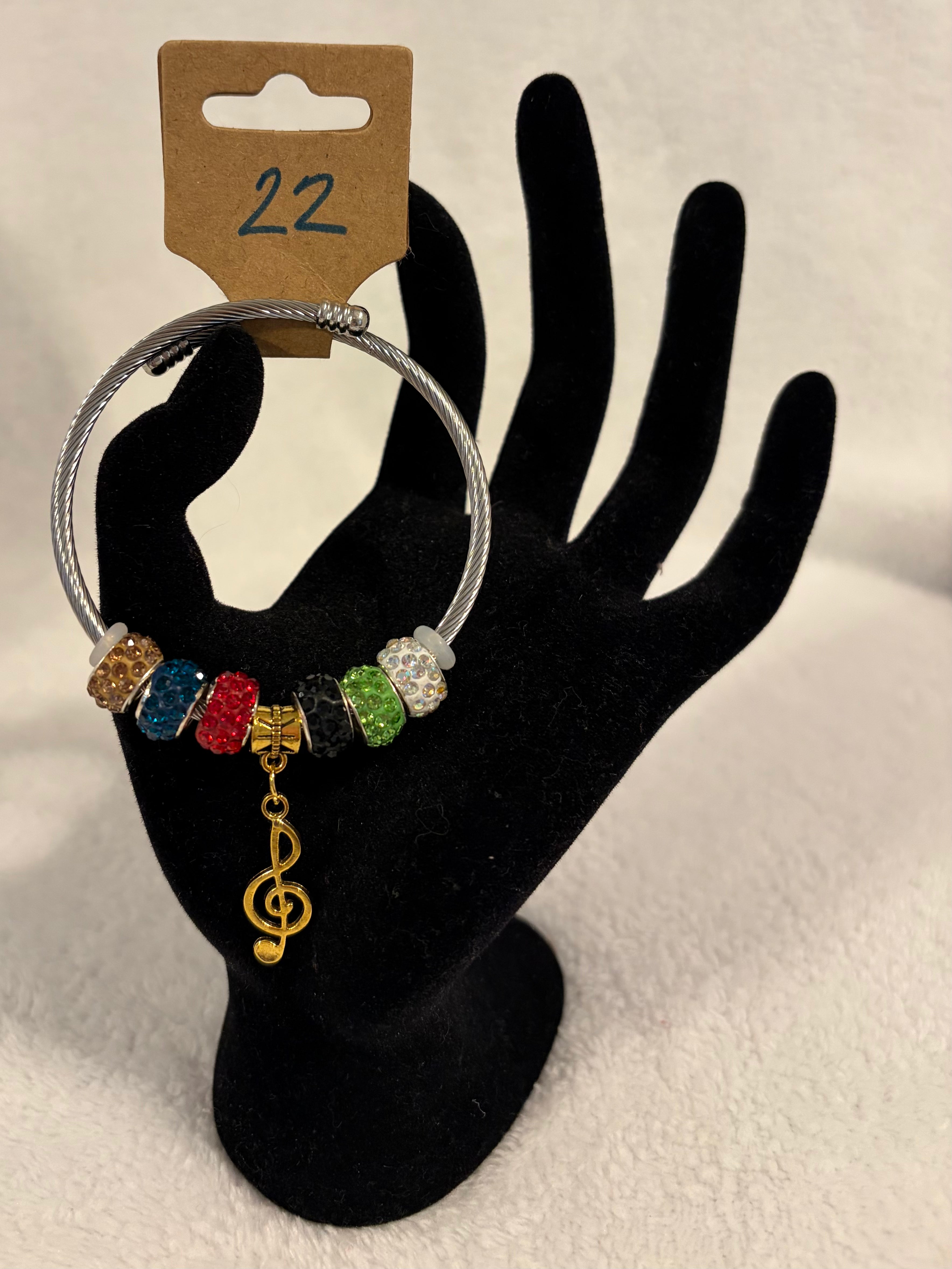 Stainless steel wrap bracelet with music charm