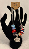 Stainless steel adjustable bracelet “All Mad Here” charm