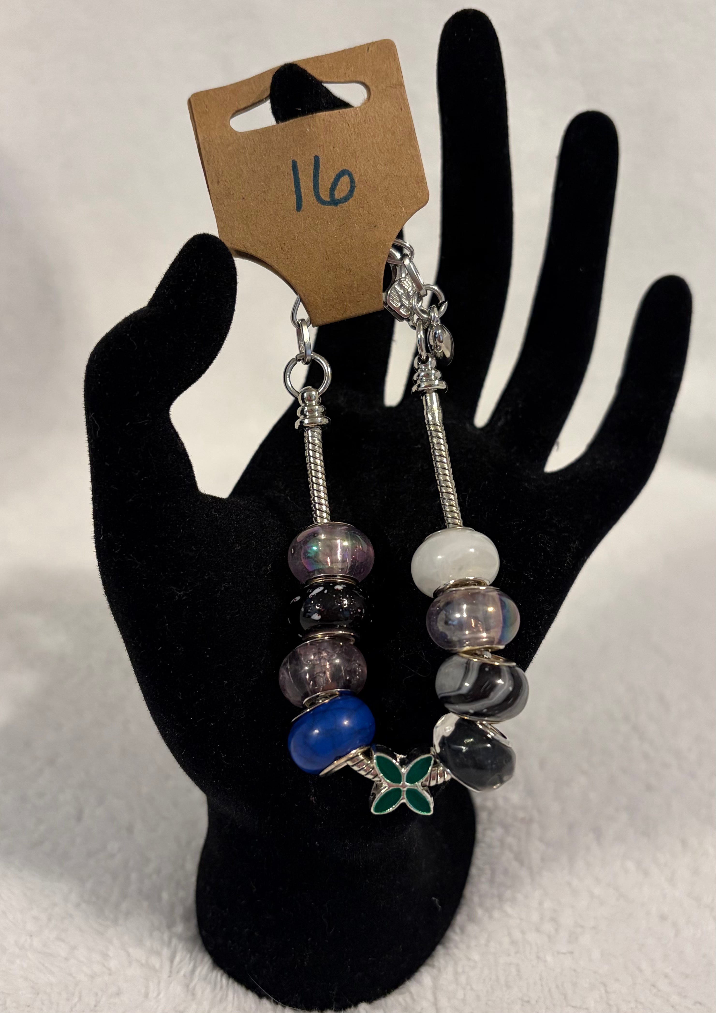 Stainless steel adjustable bracelet with butterfly charm