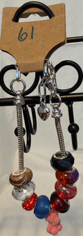 Adjustable silver bracelet with bear charm